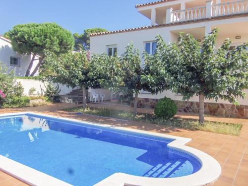Spacious Holiday Home in L Escala with Swimming Pool
