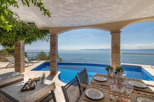 Goldhome - Villa con piscina privada, pista de tenis y vistas espectaculares al mar